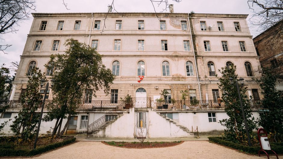 Front view of a historic former French orphanage building in Istanbul.