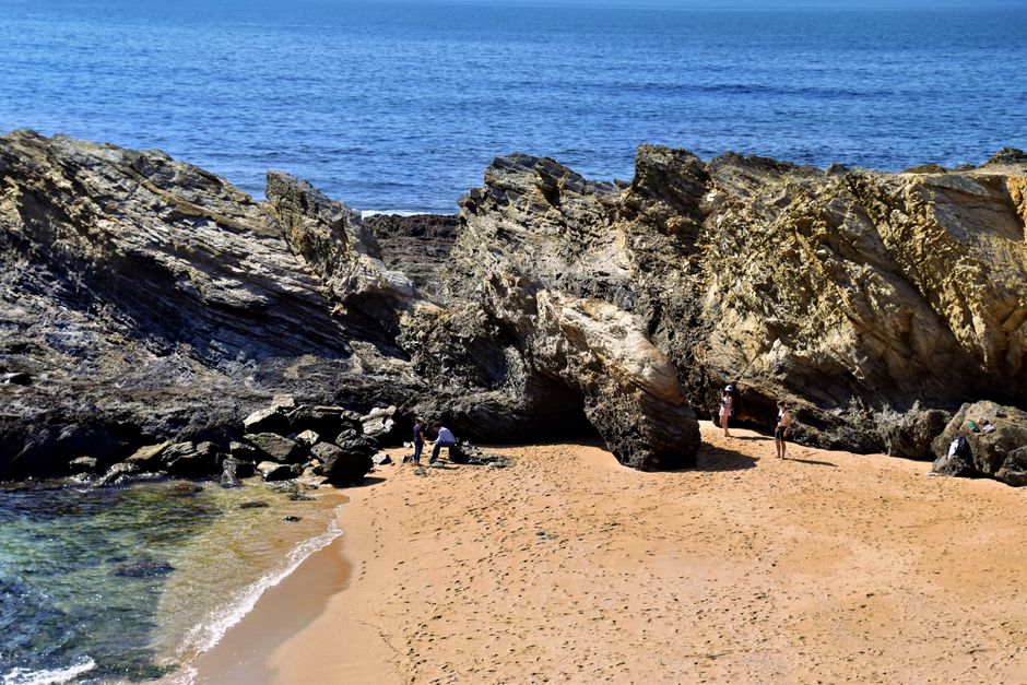 Sandy cove and rock formations on the Algarve coast on a mild February day
