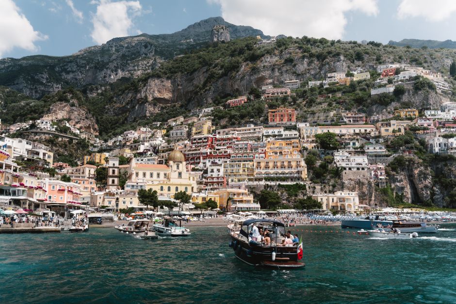 Experience the vibrant colors and charming architecture of Positano along the stunning Amalfi Coast in Italy.
