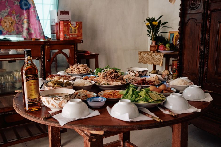A sumptuous spread for Tet celebration in Ben Tre, Vietnam showcasing traditional Vietnamese cuisine.
